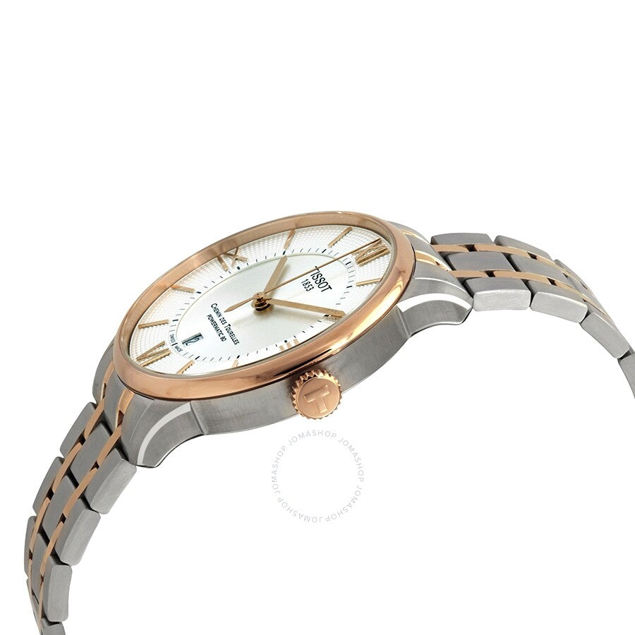 Side view of Tissot Chemin des Tourelles watch showing rose gold crown and two-tone bracelet