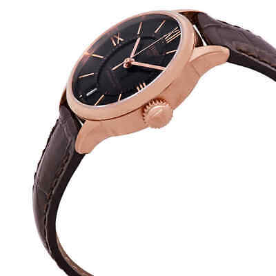 Side profile of Tissot Chemin Des Tourelles watch showing rose gold case and crown