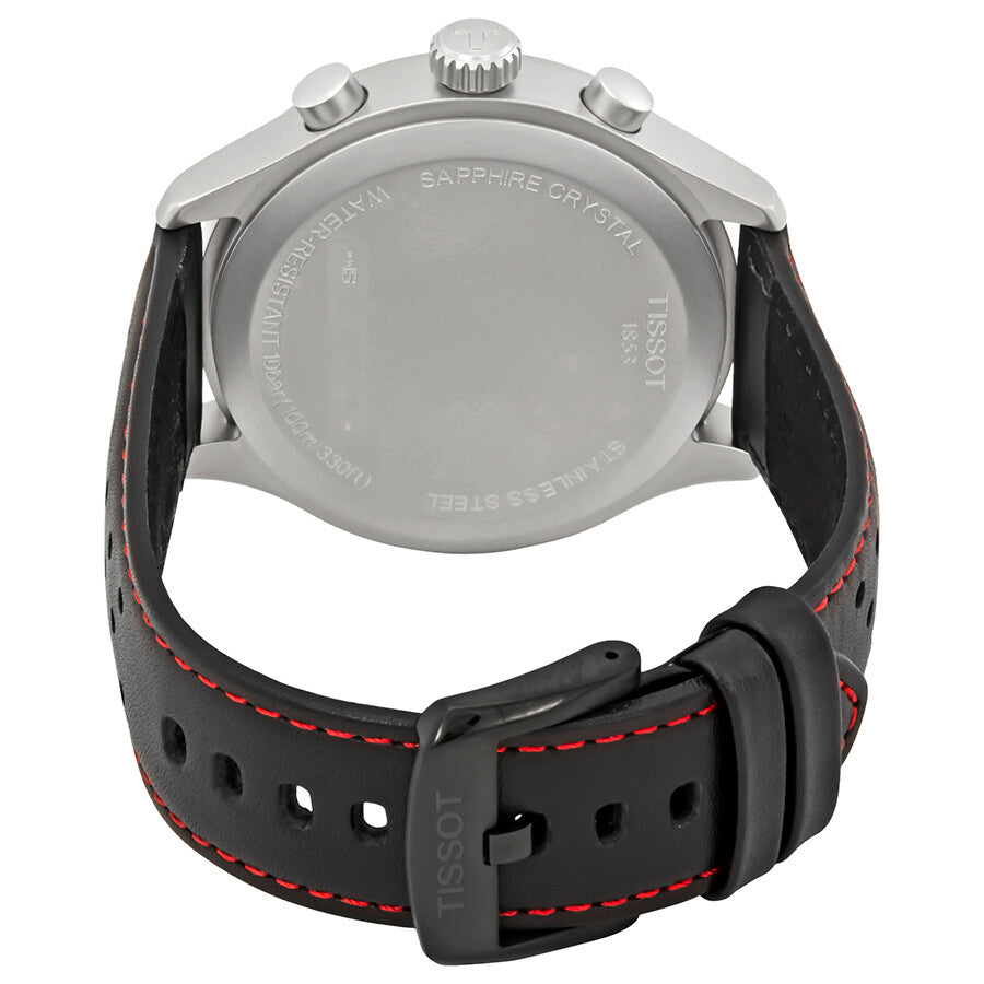 Tissot Chrono XL caseback showing stainless steel case with engraved text and black rubber strap