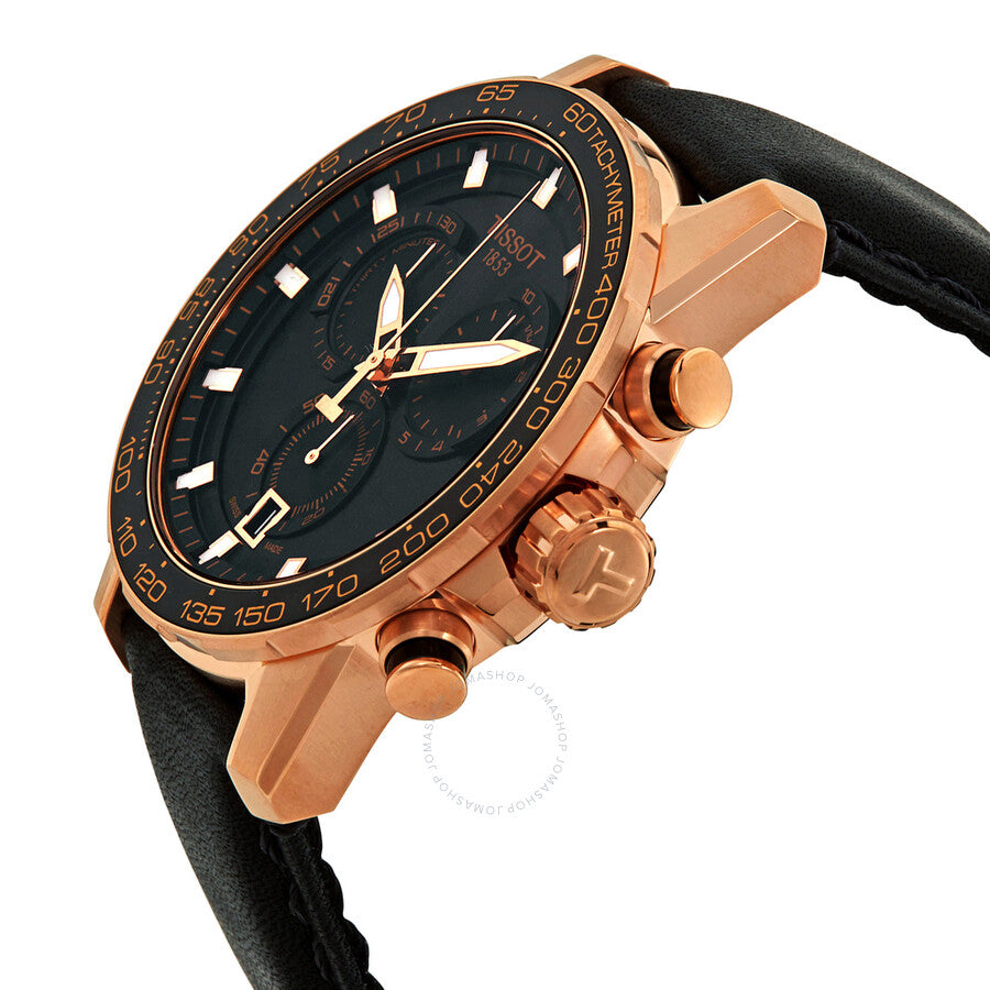 Tissot chronograph watch from side angle showing rose gold case and pushers with black strap