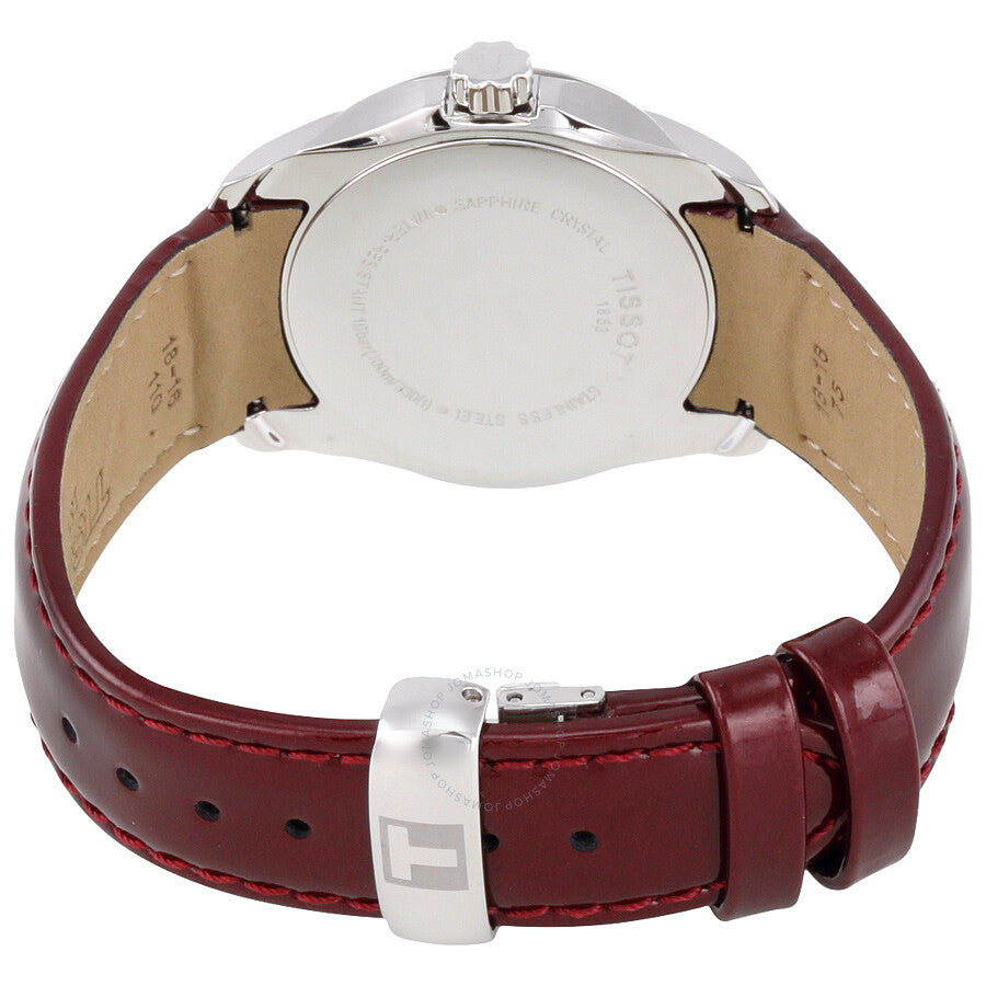 Tissot Couturier watch caseback showing stainless steel case and burgundy leather strap