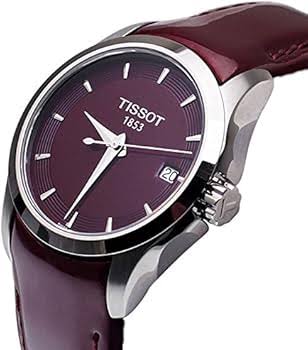 Tissot Couturier quartz watch featuring burgundy dial, stainless steel case, and burgundy leather strap
