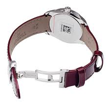 Back view of Tissot Couturier watch showing caseback with caliber information and burgundy leather strap