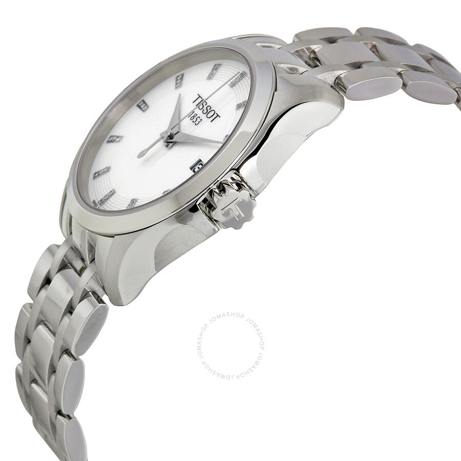 Tissot Couturier watch angled side view showing silver dial and stainless steel bracelet