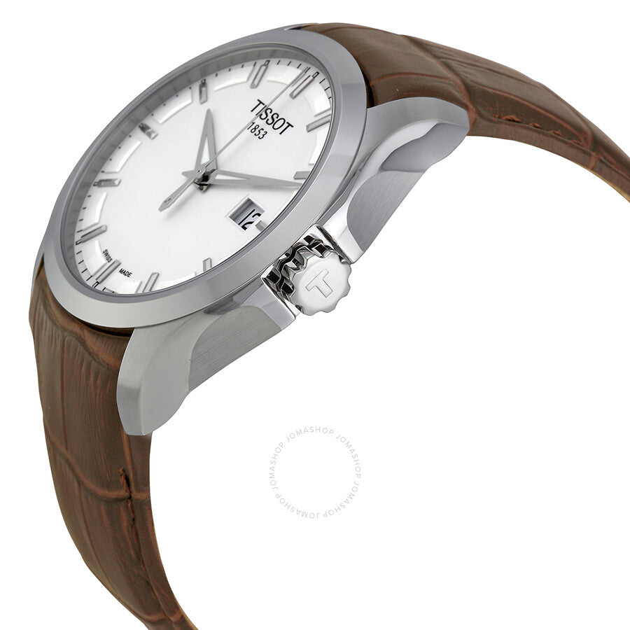 Tissot Couturier watch angled view showing silver case, white dial, and brown leather strap