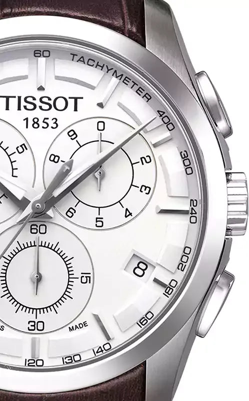 Close-up of Tissot Couturier silver dial with tachymeter and three chronograph subdials