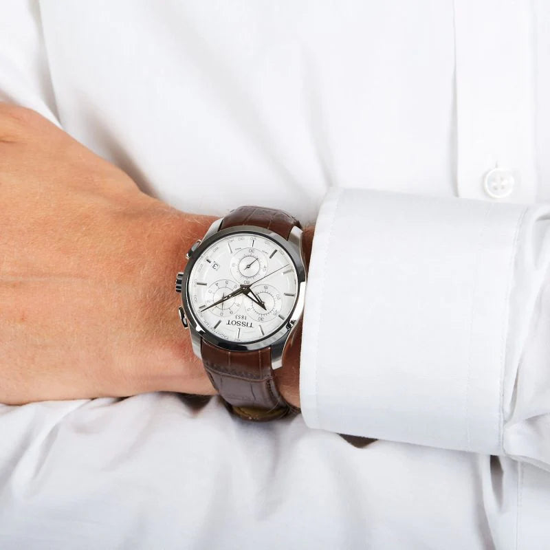 Tissot Couturier chronograph on wrist with brown leather strap