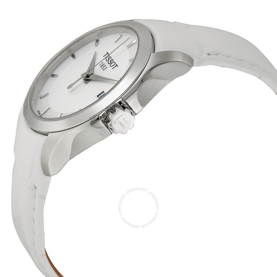 Side view of Tissot Couturier ladies watch showing white leather strap and stainless steel case profile