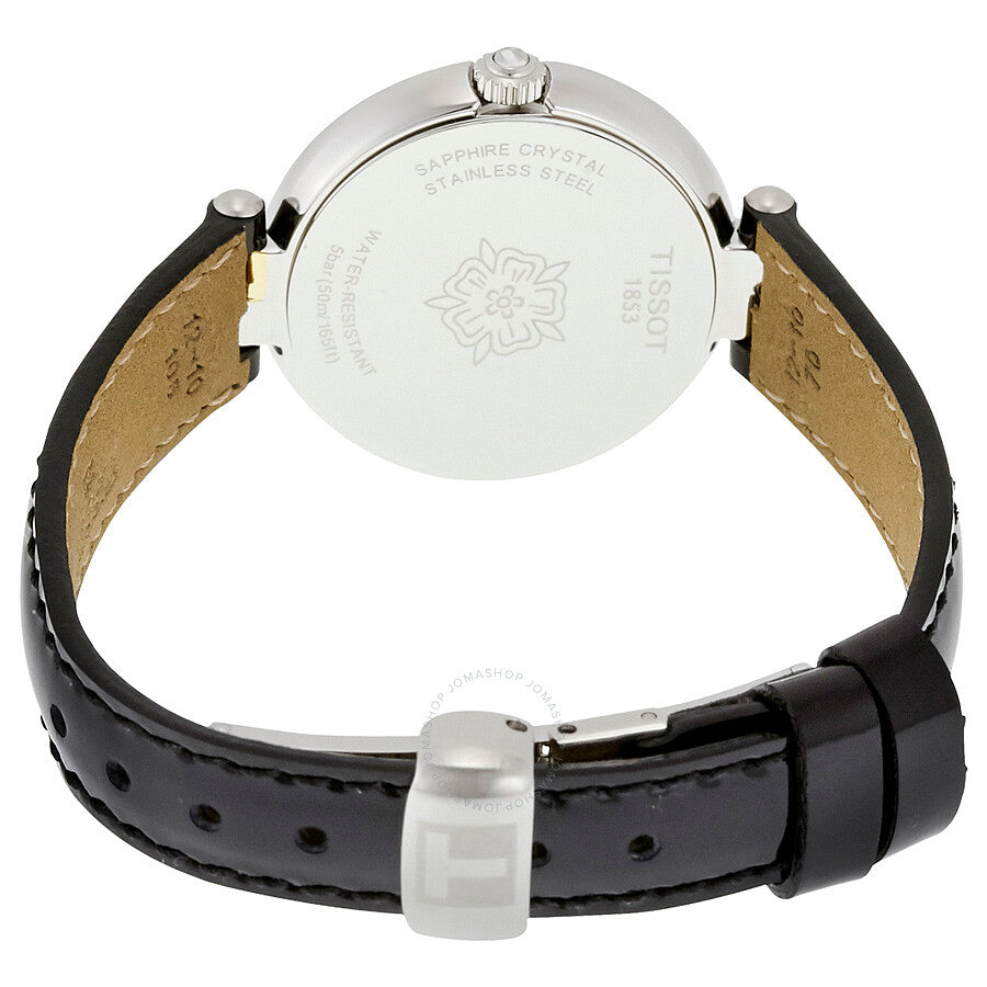 Caseback of Tissot Flamingo watch showing stainless steel case and engravings