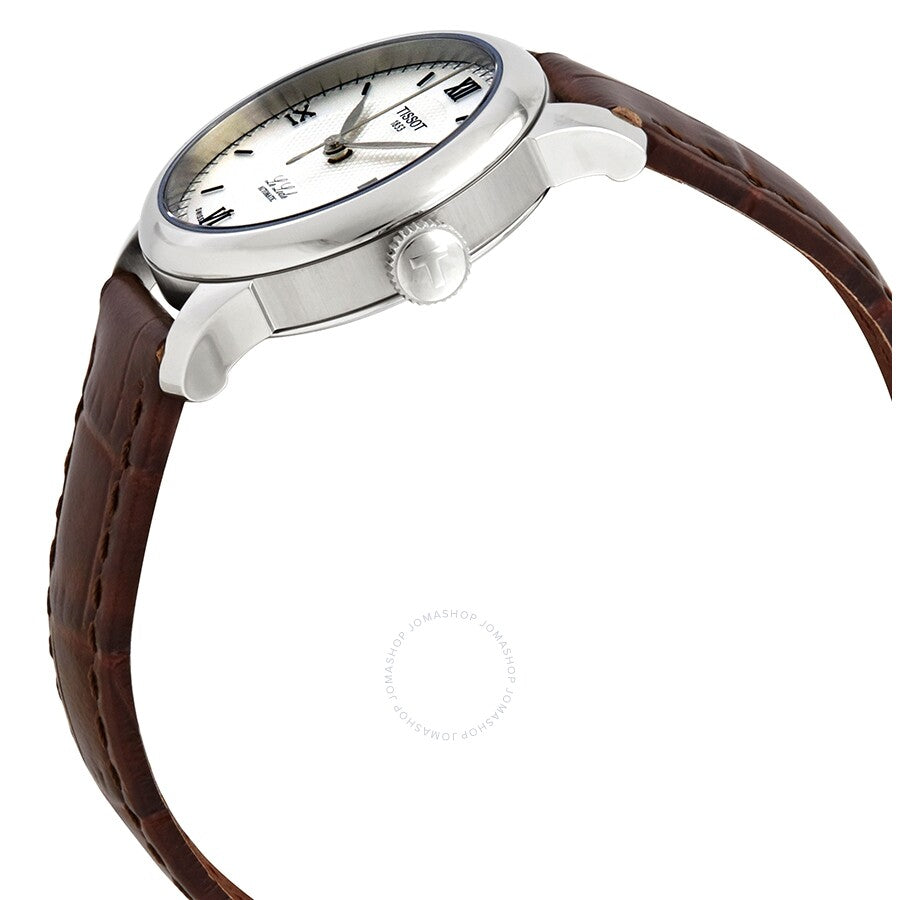 Tissot Le Locle ladies watch side angle view showing stainless steel case, silver dial, and brown crocodile-embossed leather strap