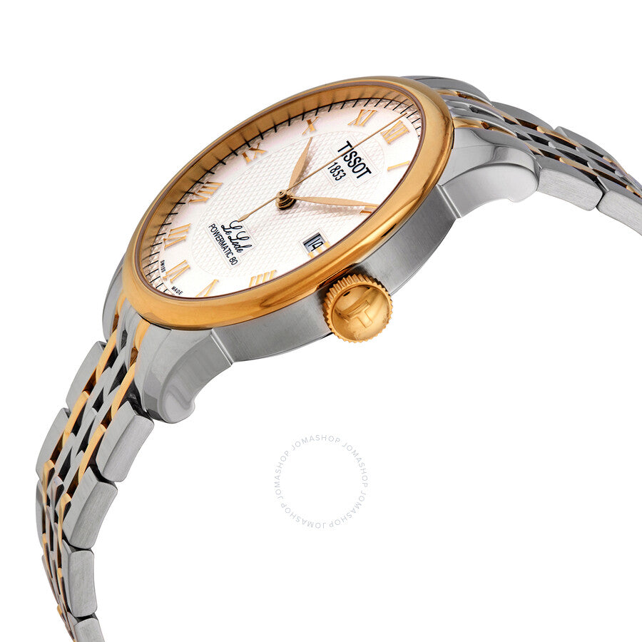 Side angle view of Tissot Le Locle watch showing gold-plated bezel and date window