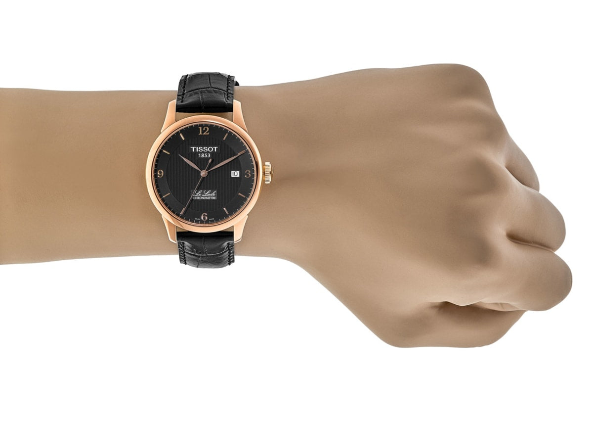 Tissot Le Locle watch worn on wrist with black leather strap