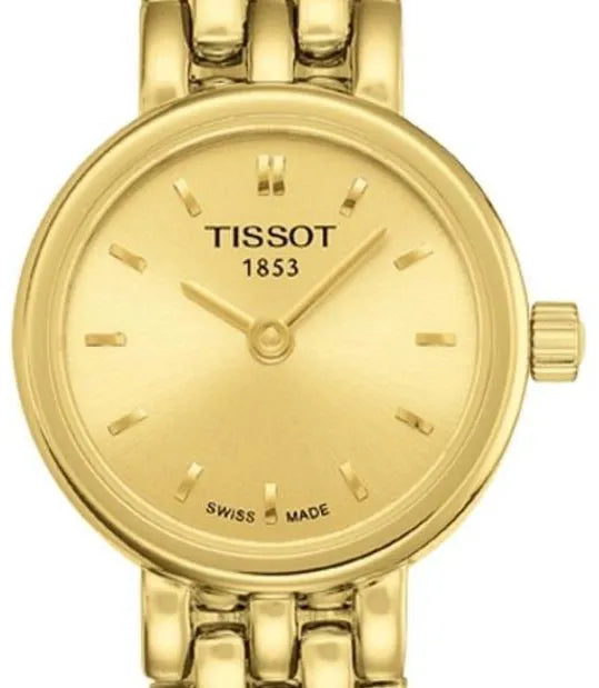 Tissot Lovely watch dial close-up showing golden face with baton markers and Swiss made text