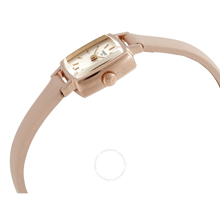 Tissot Lovely ladies watch worn on wrist with beige leather strap and rose gold case