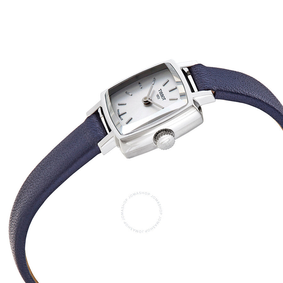Tissot Lovely watch on wrist showing silver dial and navy leather band