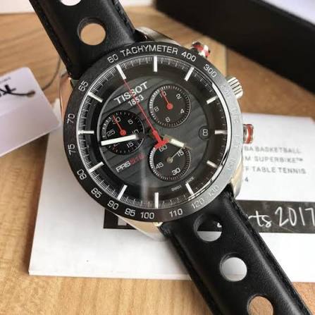 Close-up of Tissot PRS 516 black dial showing chronograph subdials and tachymeter scale