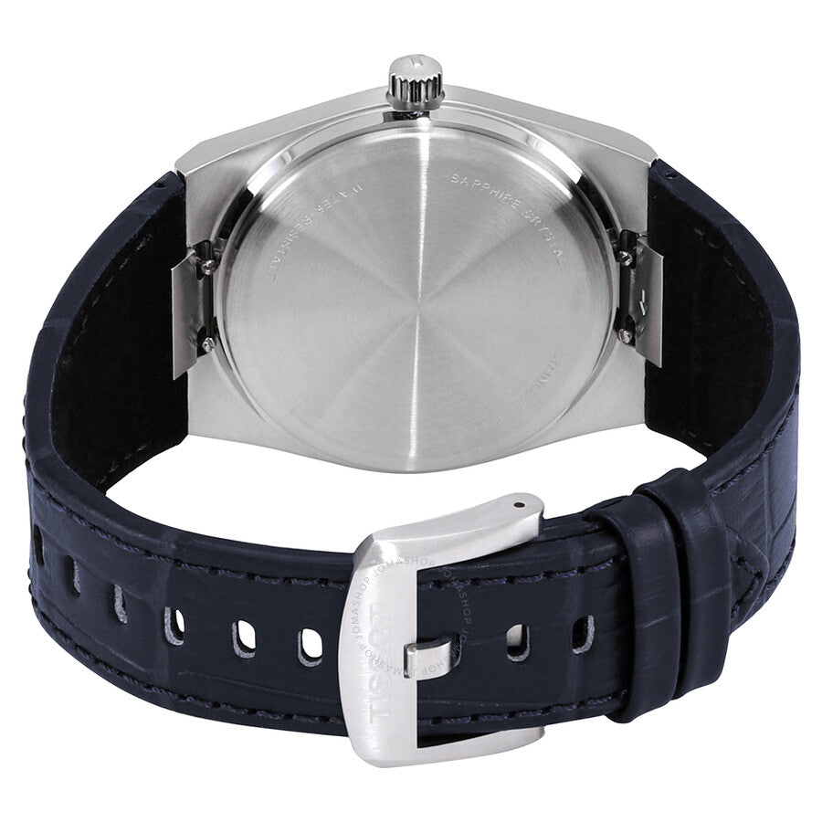 Caseback view of Tissot PRX showing stainless steel case and navy leather strap