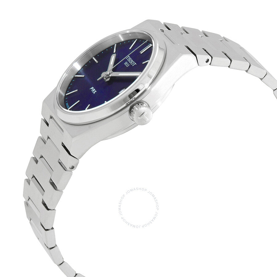 Tissot PRX watch shown at angle displaying blue dial and stainless steel bracelet profile