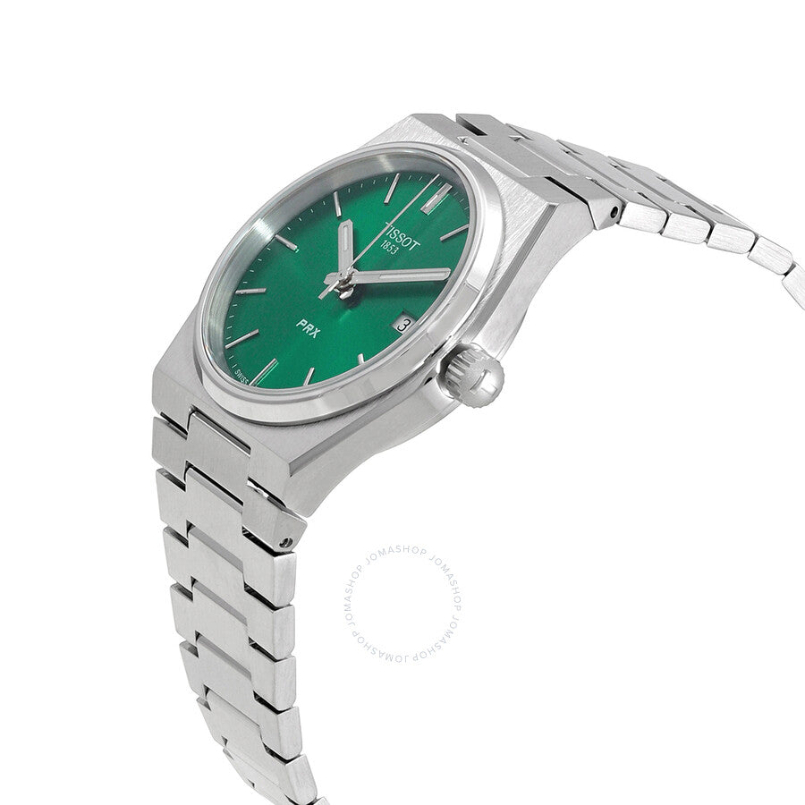 Tissot PRX watch at angle showing green dial, stainless steel case and three-link bracelet