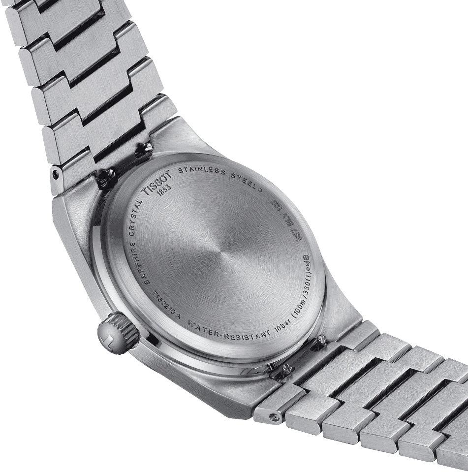 Tissot PRX caseback detail showing water resistance and specifications