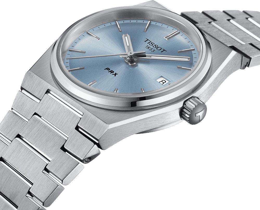 Tissot PRX light blue dial detail with applied indices and date window