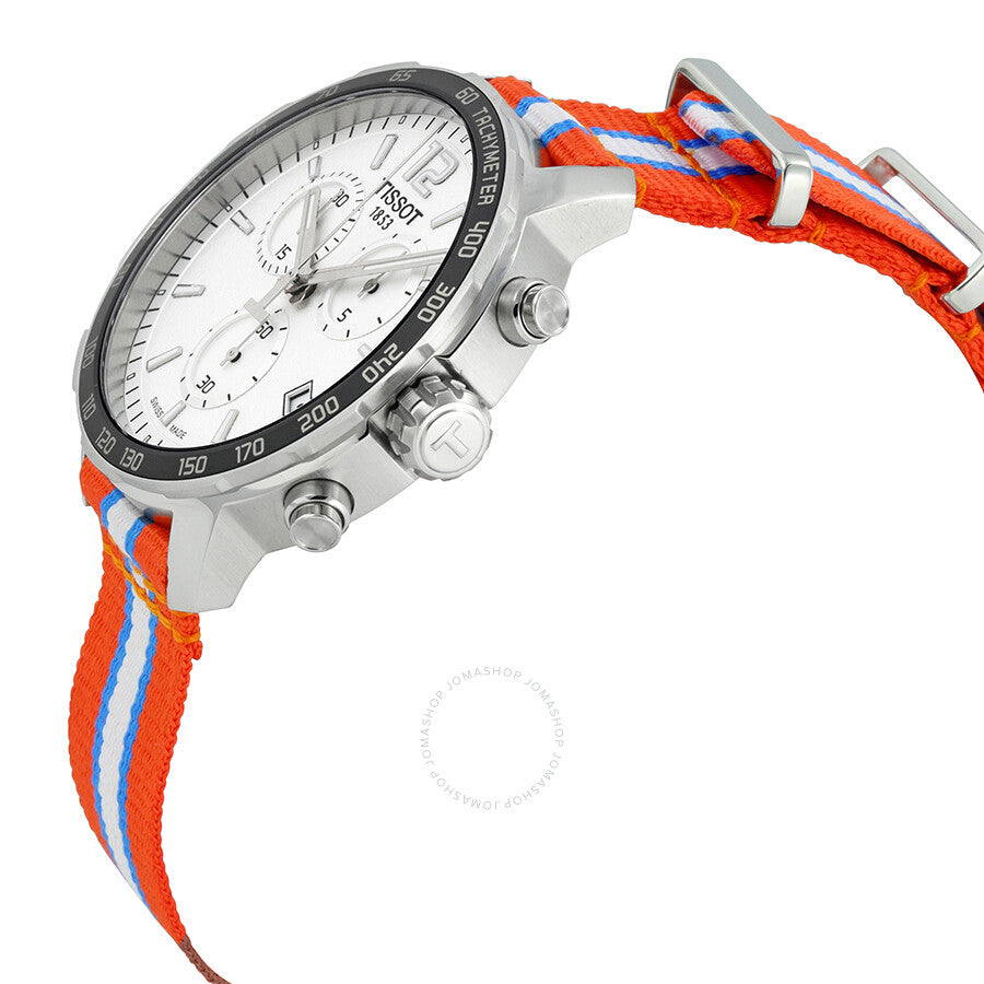 Side angle view of Tissot Quickster chronograph with silver case and orange strap
