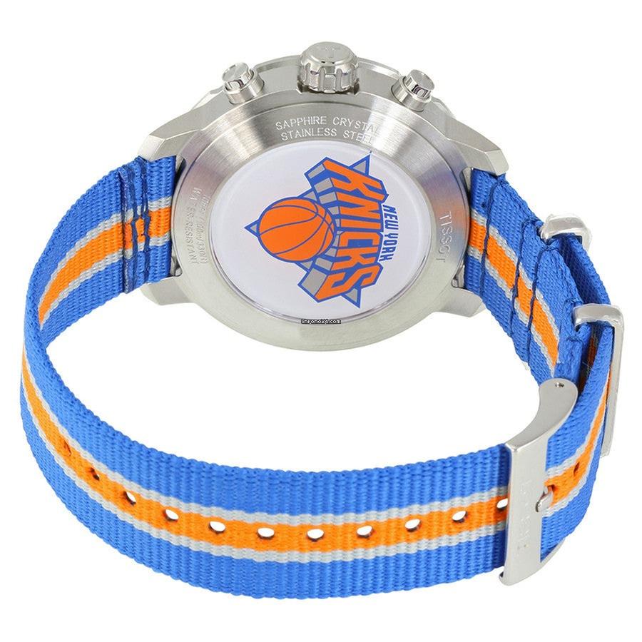Tissot Quickster caseback with transparent display and blue/orange textile strap