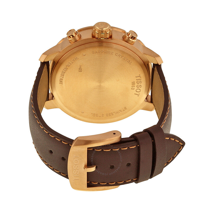 Tissot Quickster caseback showing rose gold case back with brown leather strap