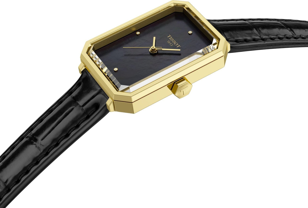 Tissot SRV watch side angle view showing yellow gold rectangular case and black crocodile leather strap