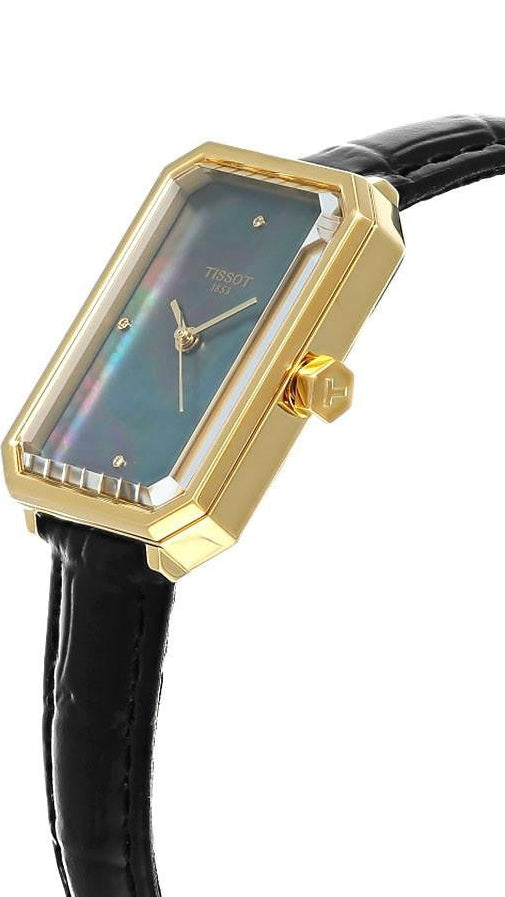 Tissot SRV women's watch on wrist displaying black MOP dial with gold hands and rectangular yellow gold case
