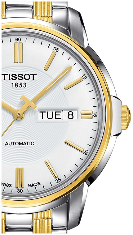Tissot T Classic Automatic dial detail showing white face gold indices and automatic movement