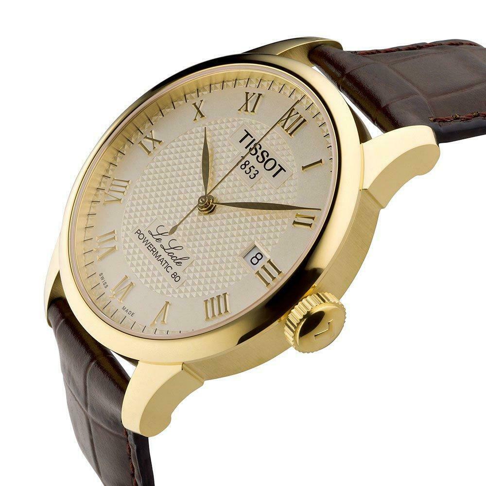 Tissot T41.5.413.73 watch angled view showing gold case and maroon leather strap