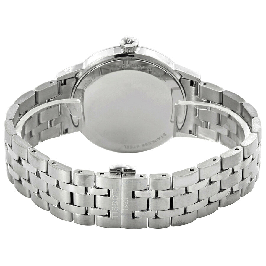 Tissot T-Classic watch caseback showing solid stainless steel back and three-link bracelet
