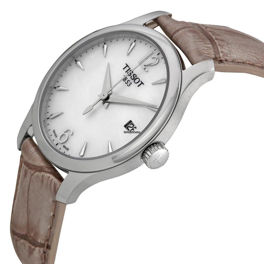 Tissot T Classic Tradition watch angled view showing stainless steel case and brown strap