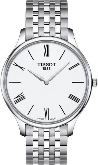 Tissot T Classic Tradition watch with white dial and Roman numerals on stainless steel bracelet