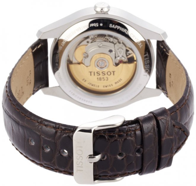 Tissot T-One caseback showing automatic movement, sapphire crystal, and brown leather strap