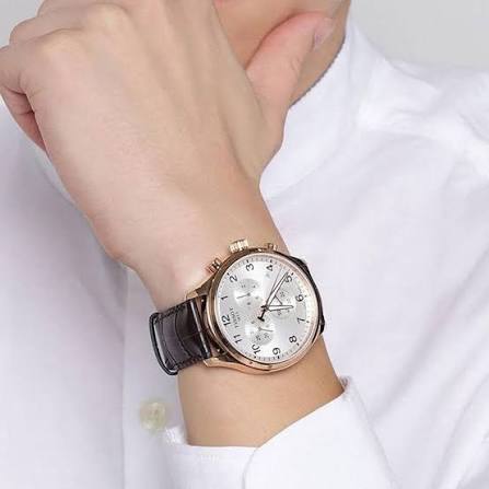 Tissot T-Sport Chronograph XL worn on wrist with silver dial and brown strap