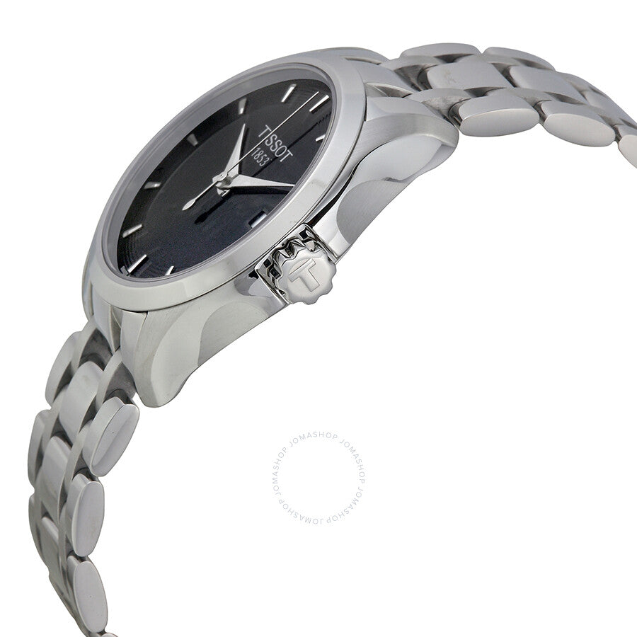 Angled view of Tissot Couturier watch showing case profile and stainless steel band