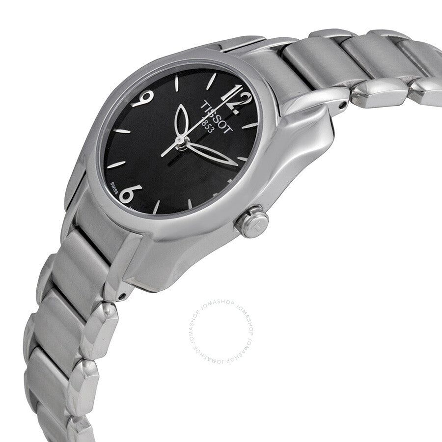 Tissot T-Wave watch on wrist showing black dial and stainless steel bracelet at angle