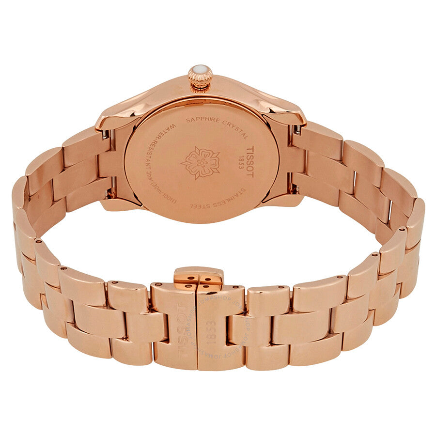 Tissot T-Wave caseback showing sapphire crystal and rose gold case construction