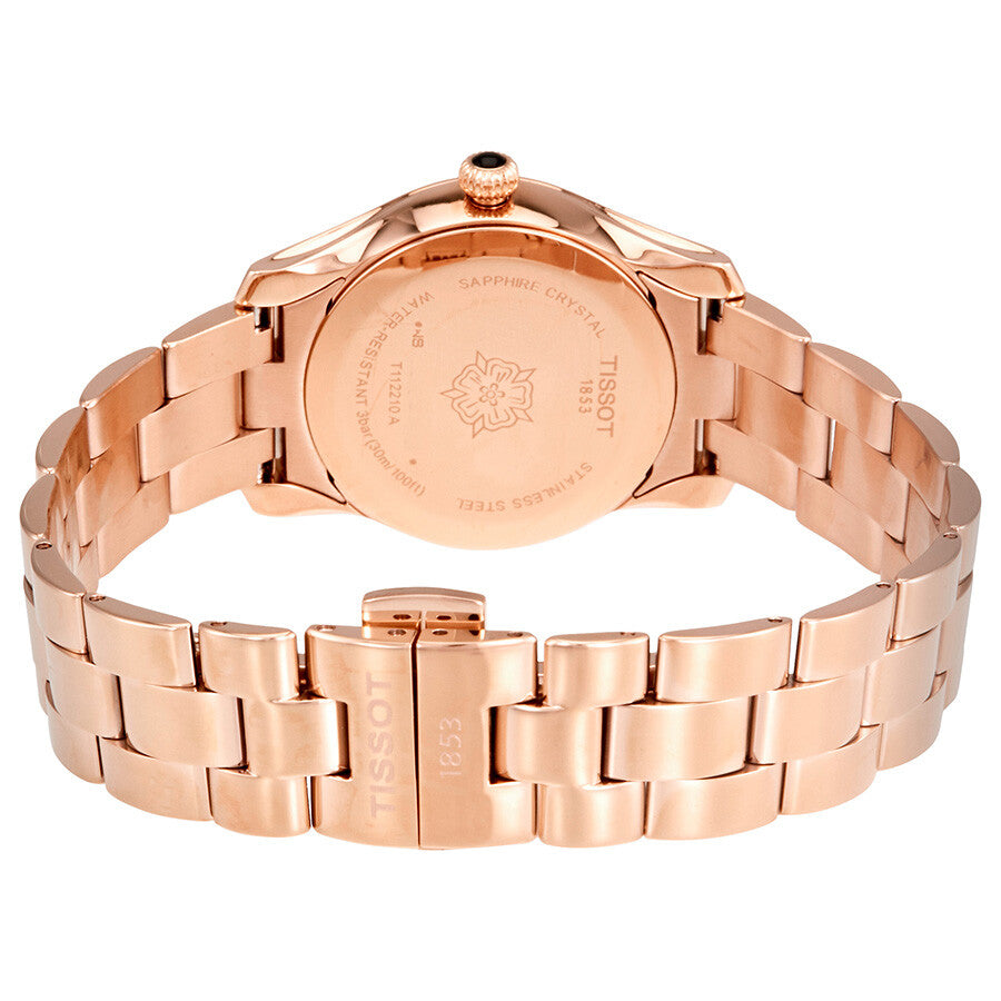 Tissot T-Wave caseback showing sapphire crystal and rose gold case with engraved details