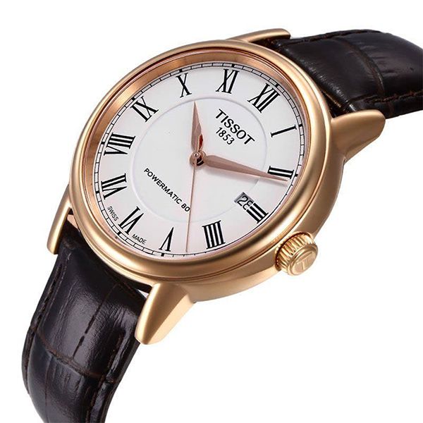 Tissot Carson watch on wrist showing rose gold case with brown alligator leather strap
