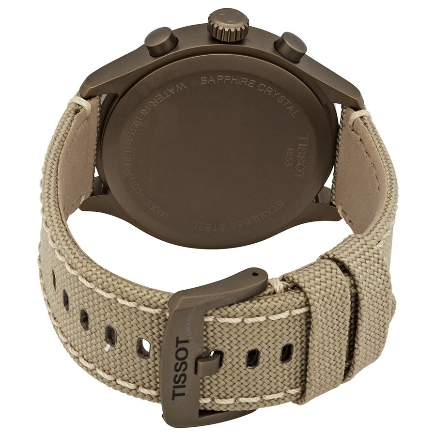 Tissot watch caseback with sapphire crystal showing stainless steel case and beige strap