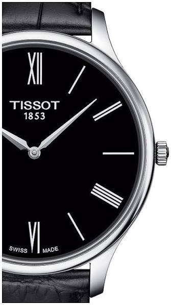 Close-up detail of Tissot Tradition dial showing Roman numerals and Tissot 1853 marking