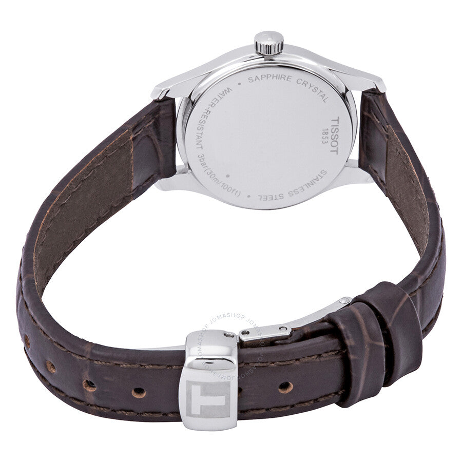Tissot Tradition 5.5 caseback showing sapphire crystal and engraved stainless steel back with brown leather strap