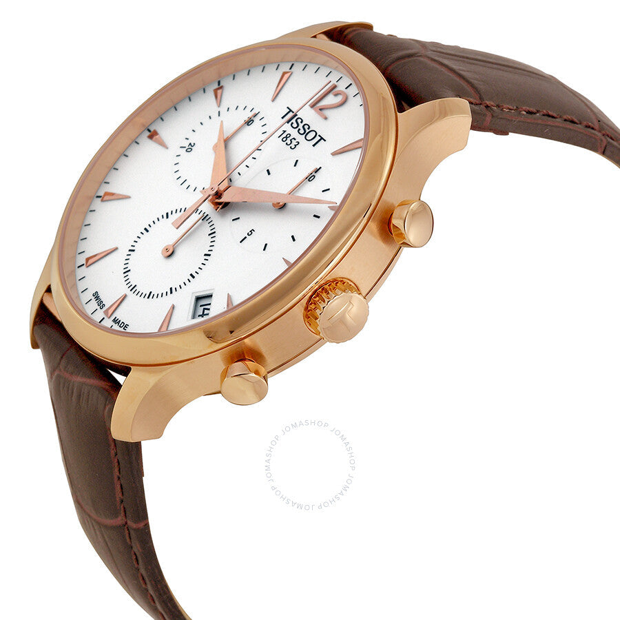 Tissot Tradition Classic Chronograph angled view showing rose gold case, white chronograph dial, and brown leather strap