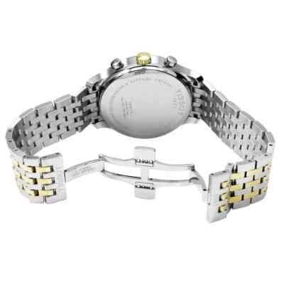 Tissot Tradition caseback view showing steel case and two-tone strap assembly