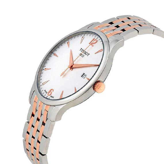 Tissot Tradition watch at angle showing silver dial, rose gold hands, and two-tone band