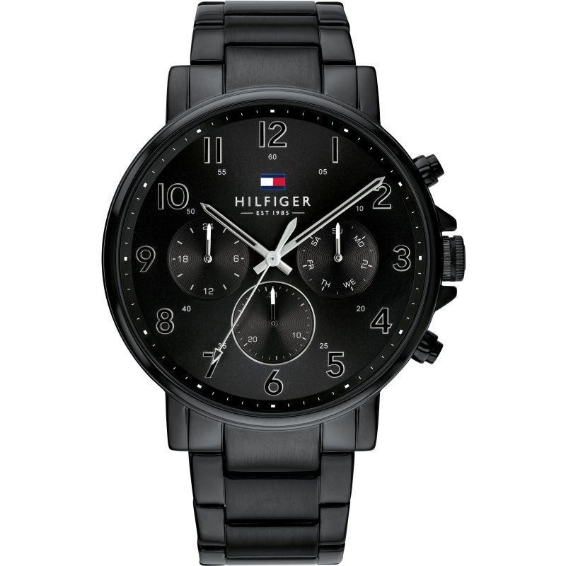 Tommy Hilfiger chronograph watch with black dial, white hands, and black steel bracelet