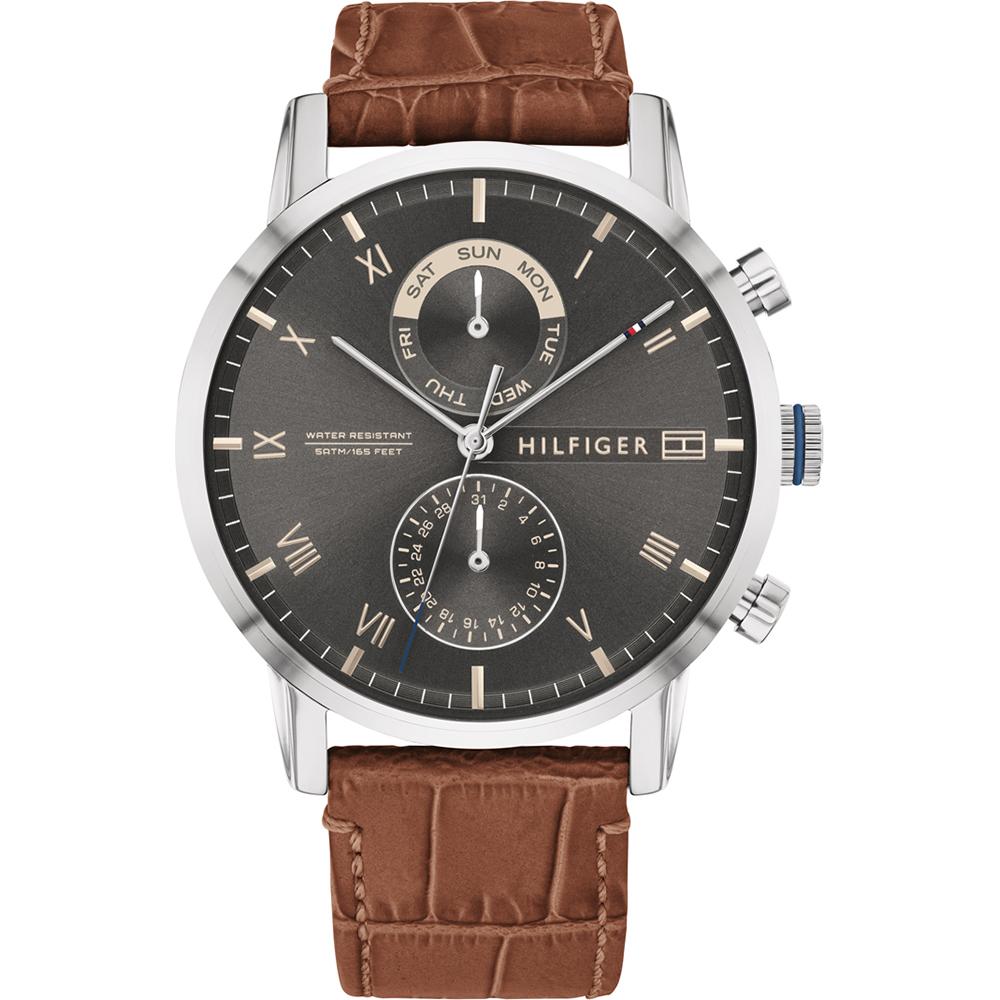 Tommy Hilfiger multifunction men's watch with black dial, chronograph subdials, Roman numerals, and brown leather strap